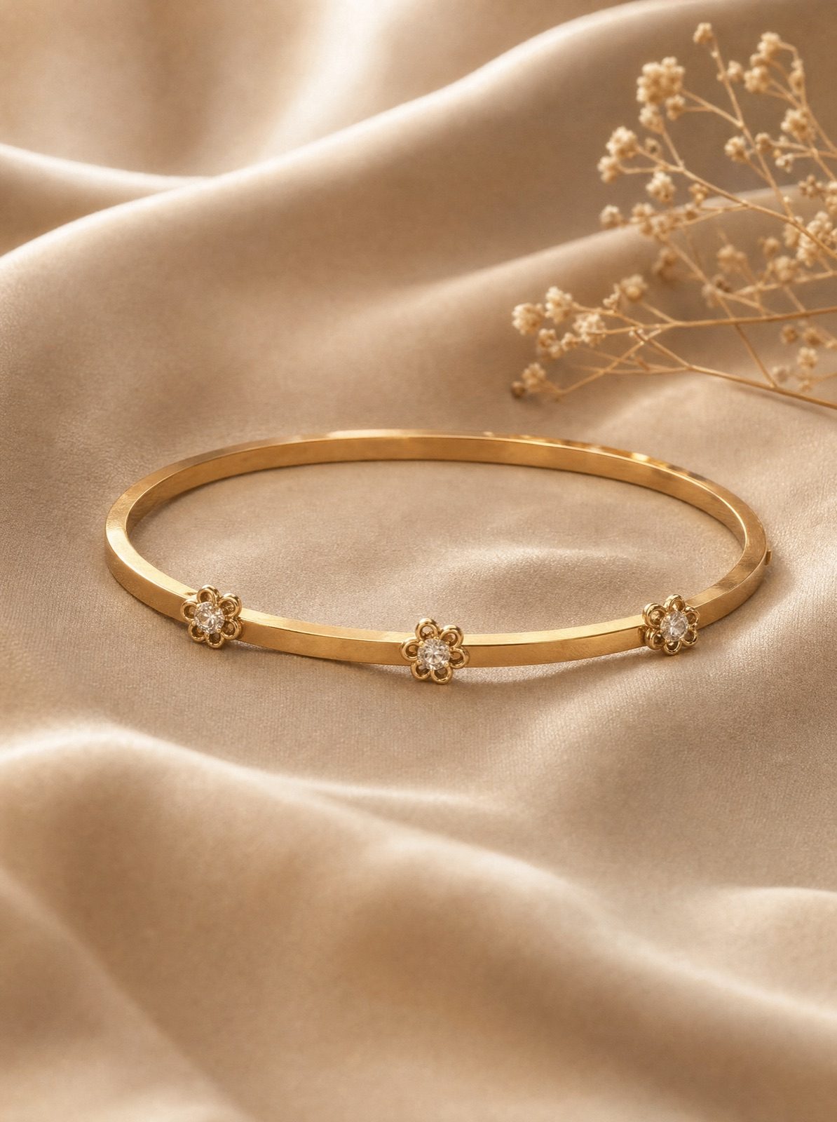 fiore bangle in gold on cream silk with dried gypsophila