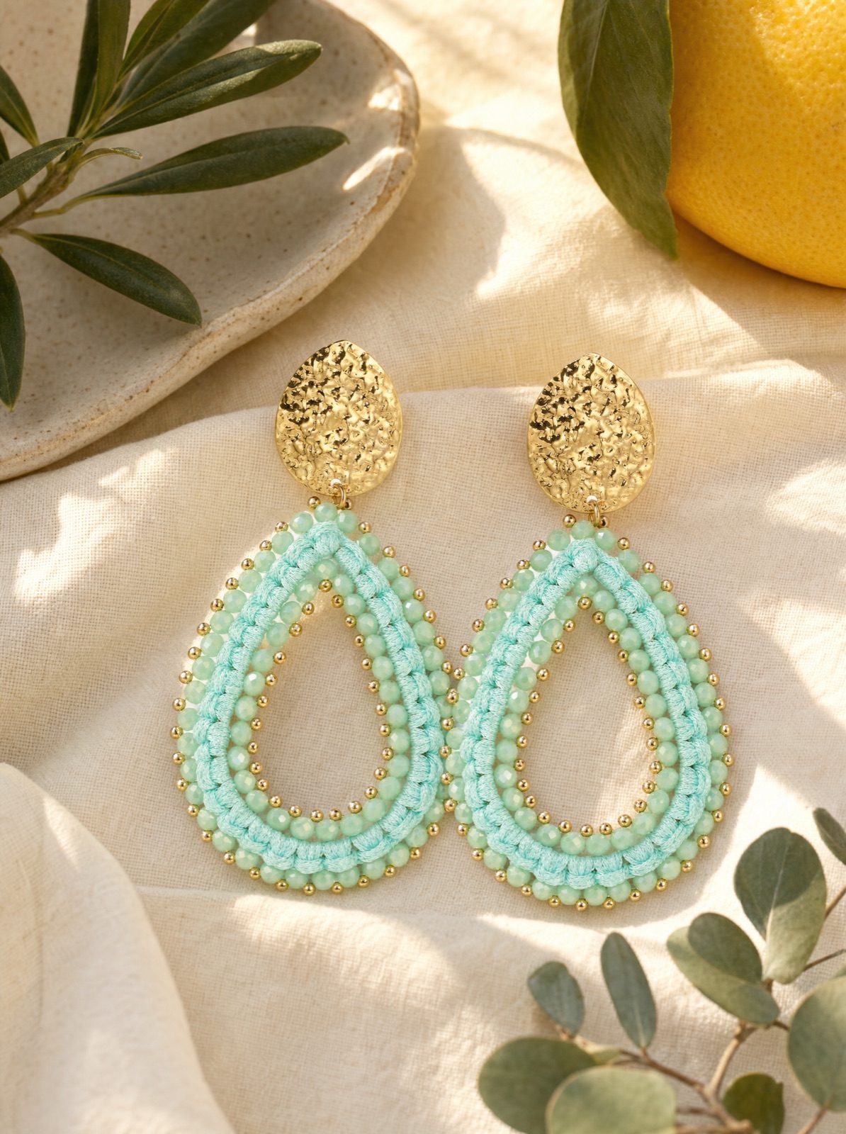 riviera drops in mint green on cream linen with an olive branch and a lemon